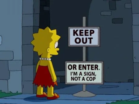 Lisa Simpson standing in front of a sign reading:'KEEP OUT...OR ENTER. I'm a sign, not a cop.