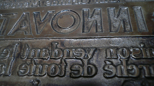 metal plate with reversed letters