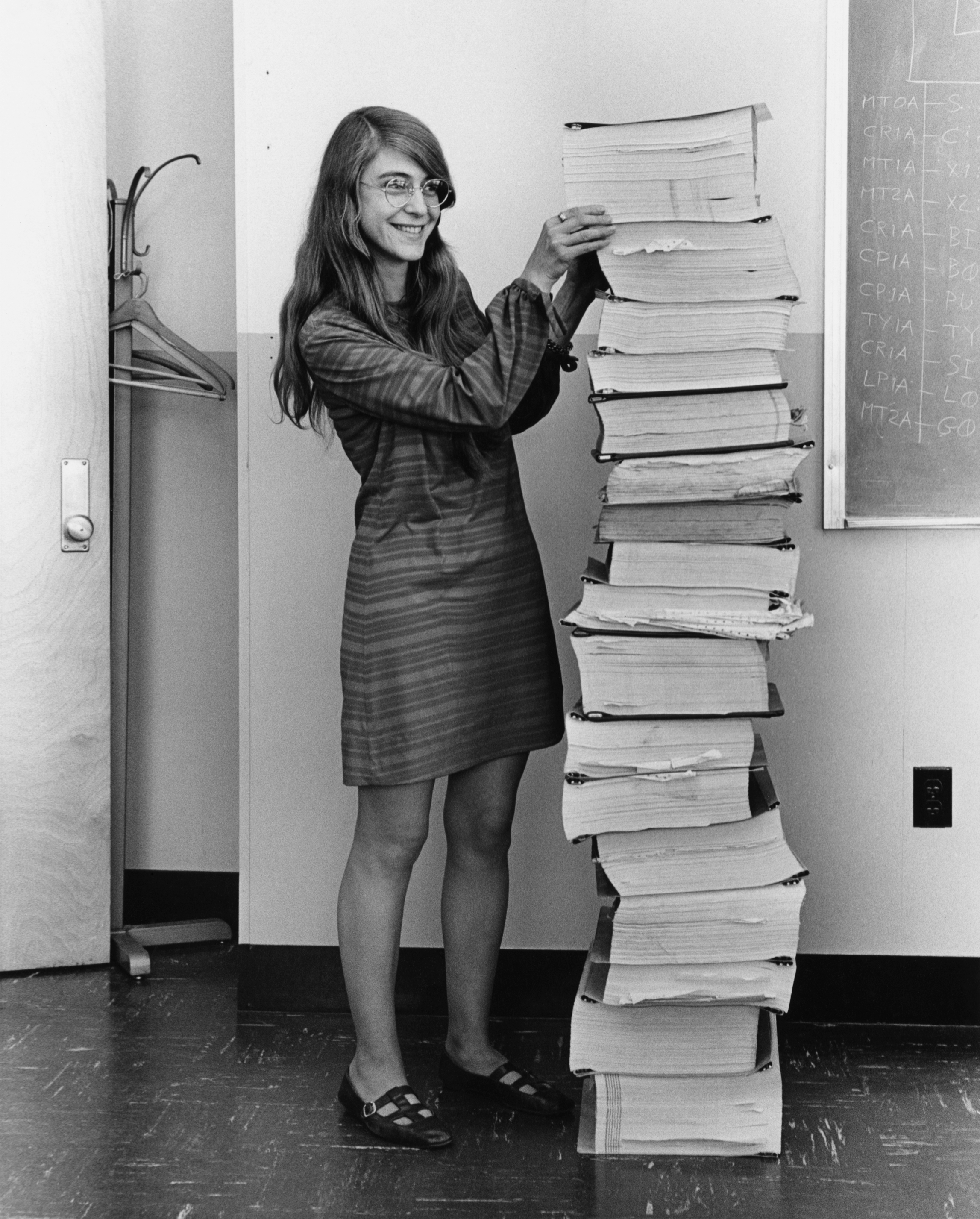 Margaret Hamilton with Apollo guidance software printouts