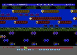 Animated gif of the 'Frogger' game, in which a frog has to cross a stream and highway to get to safety